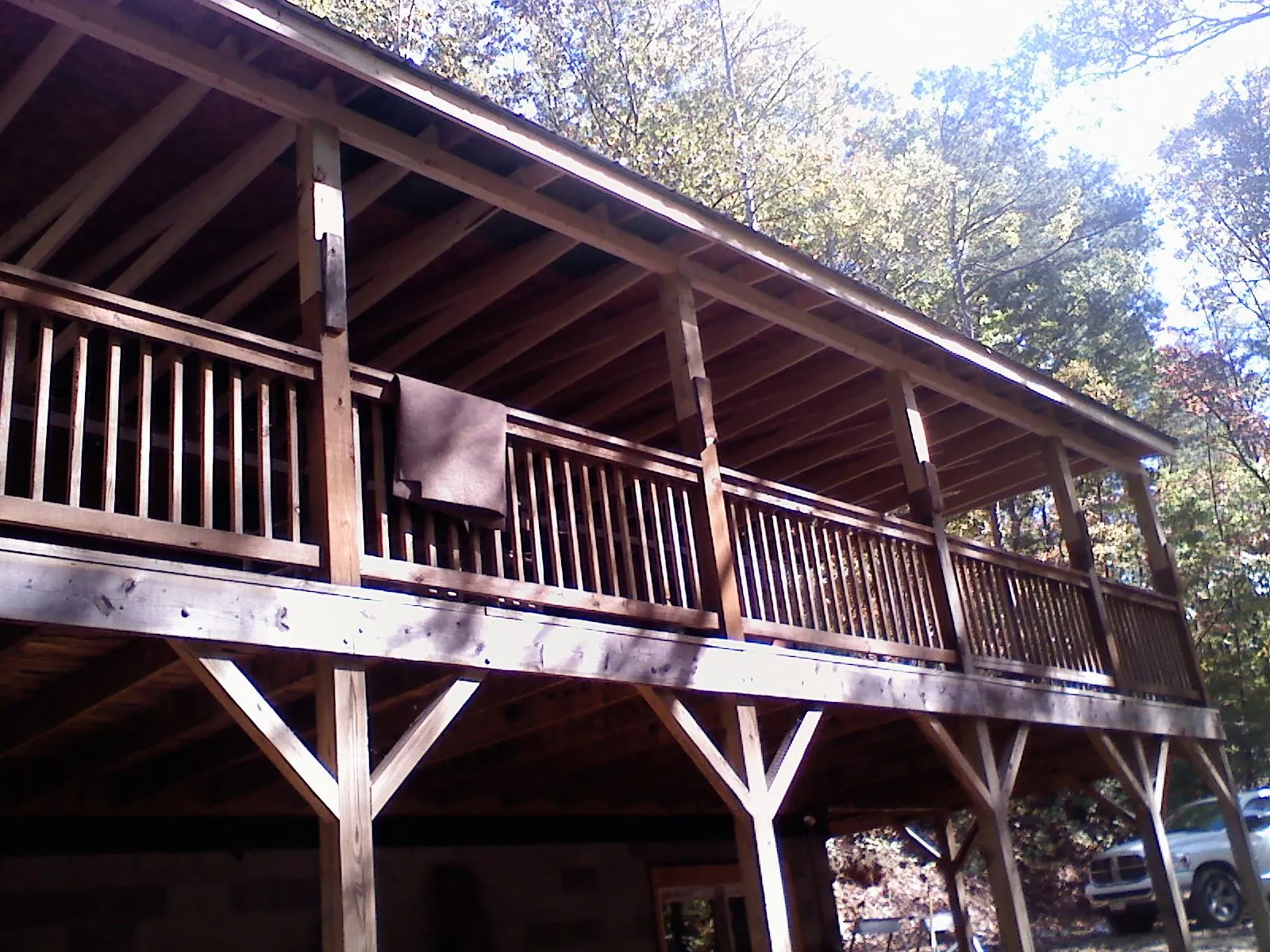 Timber framing under a new elevated porch and deck — Roof Leak Repair in Calumet by Roofing Brothers